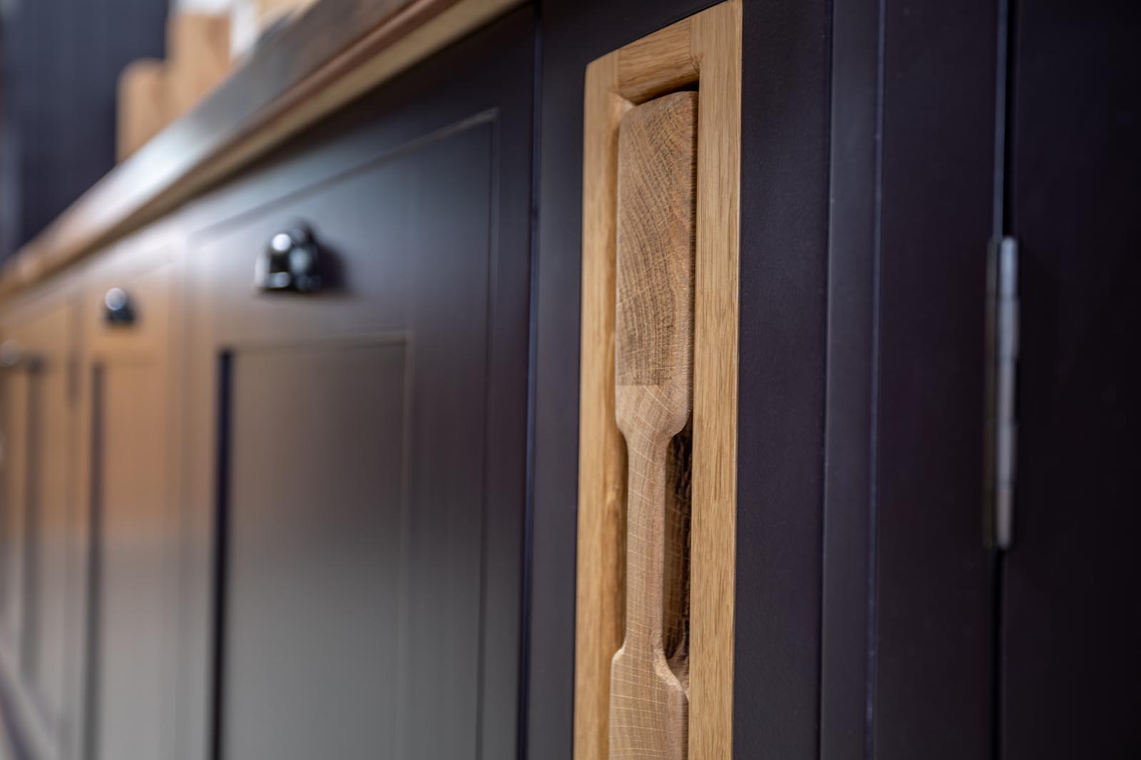 Kitchen closeup of a resessed chopping board concealed within the kitchen unit